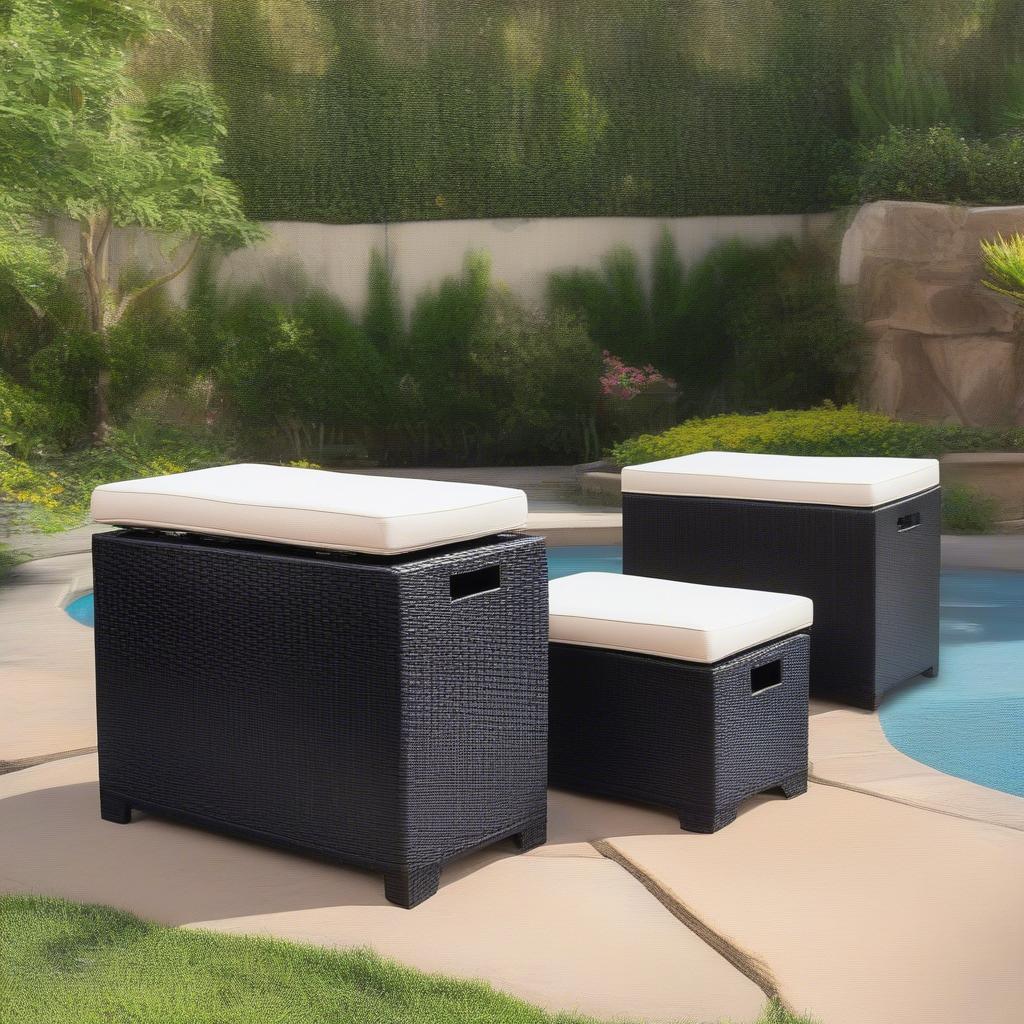 Abbyson Living Newport Outdoor Black Wicker Storage Ottoman in a patio setting