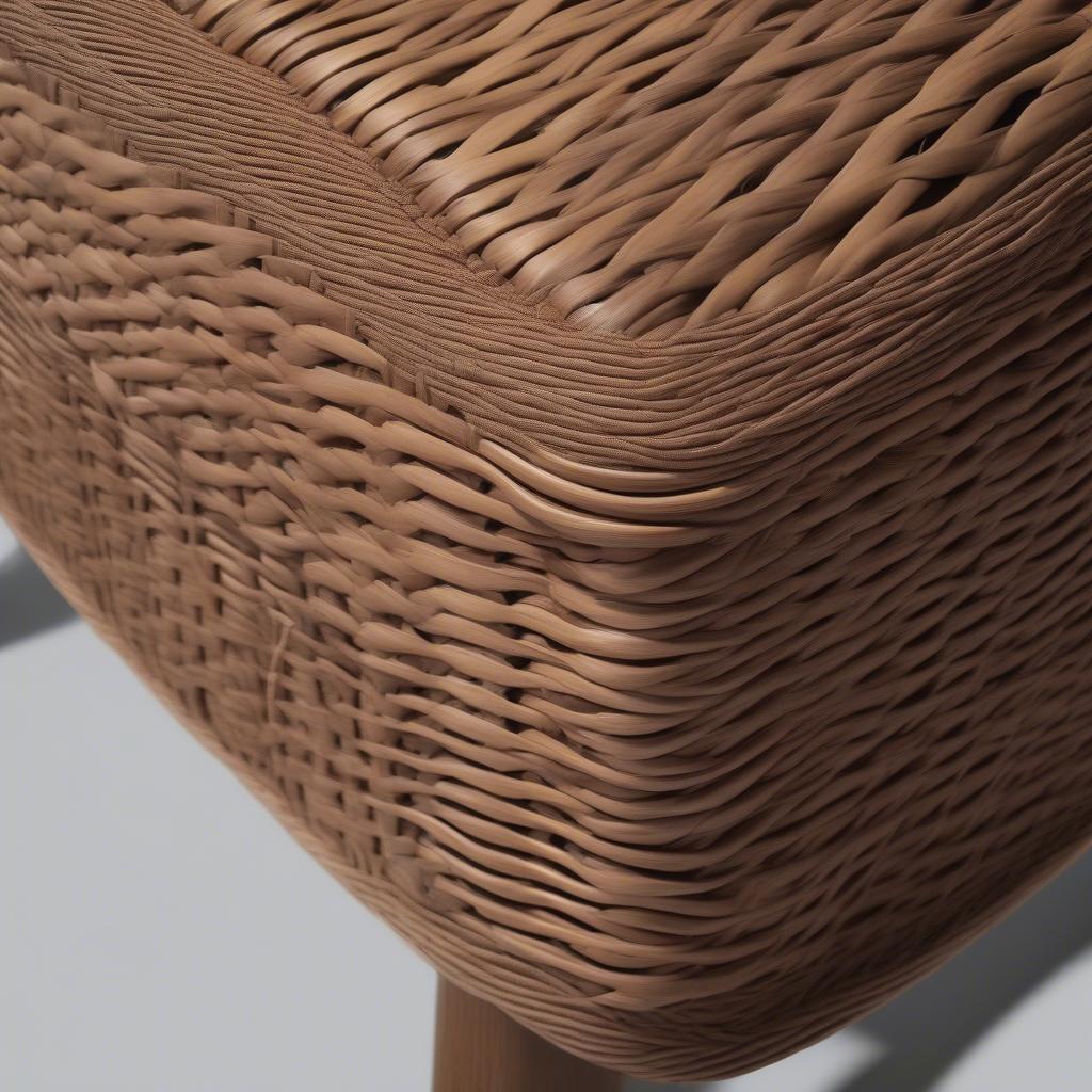 Close-up view of the Abbyson Living Palermo Ottoman's Wicker Weave