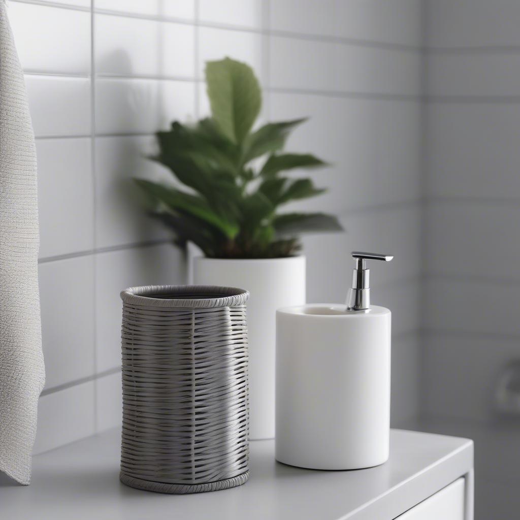 Grey wicker toilet roll holder in a modern bathroom