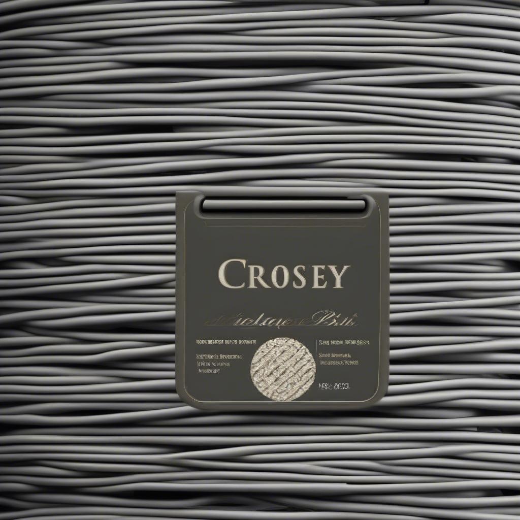 Close-up view of the Palm Harbor Outdoor Wicker Storage Bin in Gray by Crosley