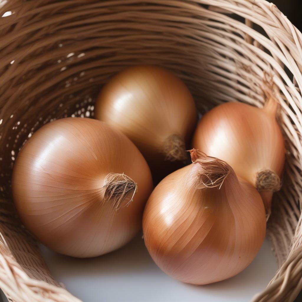 Wicker onion storage basket providing optimal ventilation for long-lasting freshness.