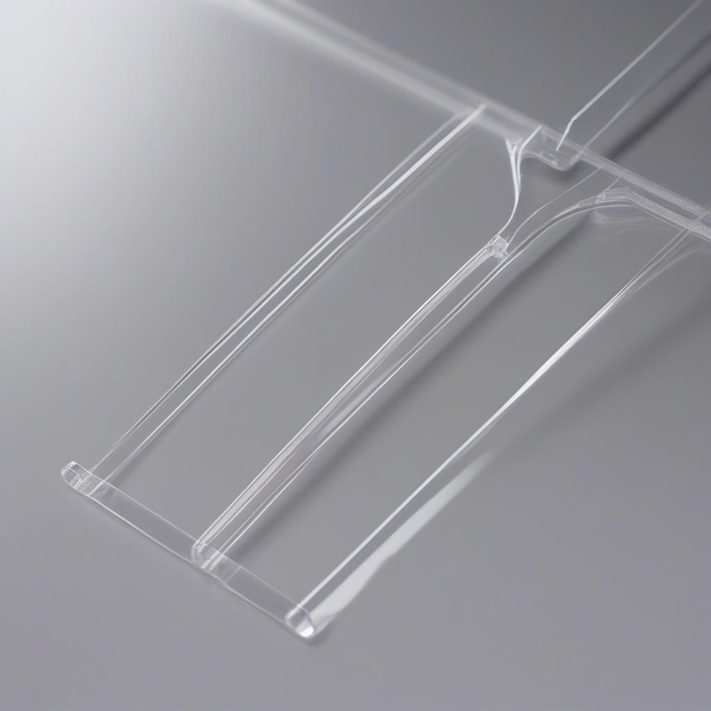 Close-up view of a clear acrylic hanger L