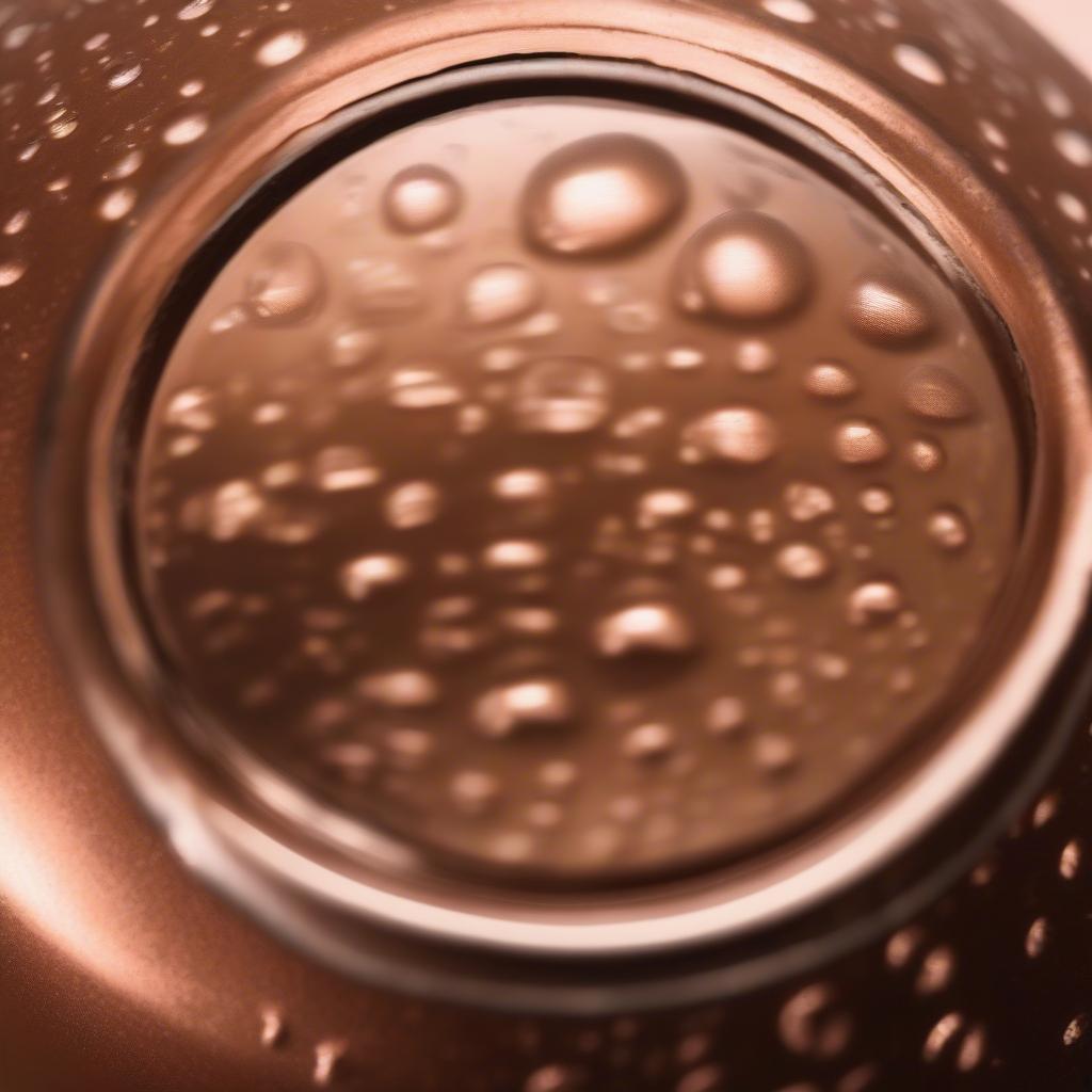 Close up of a copper water bottle filled with water