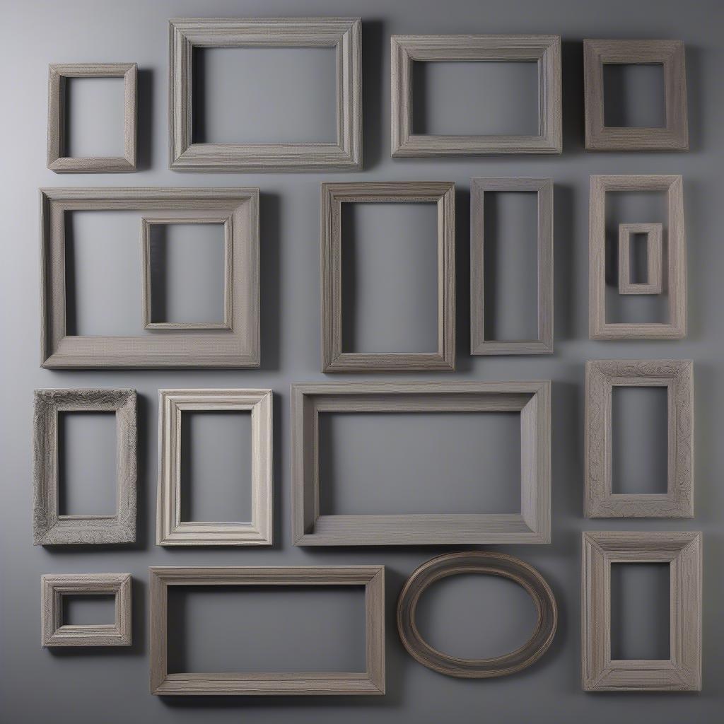 Variety of gray wooden picture frames in different styles and sizes