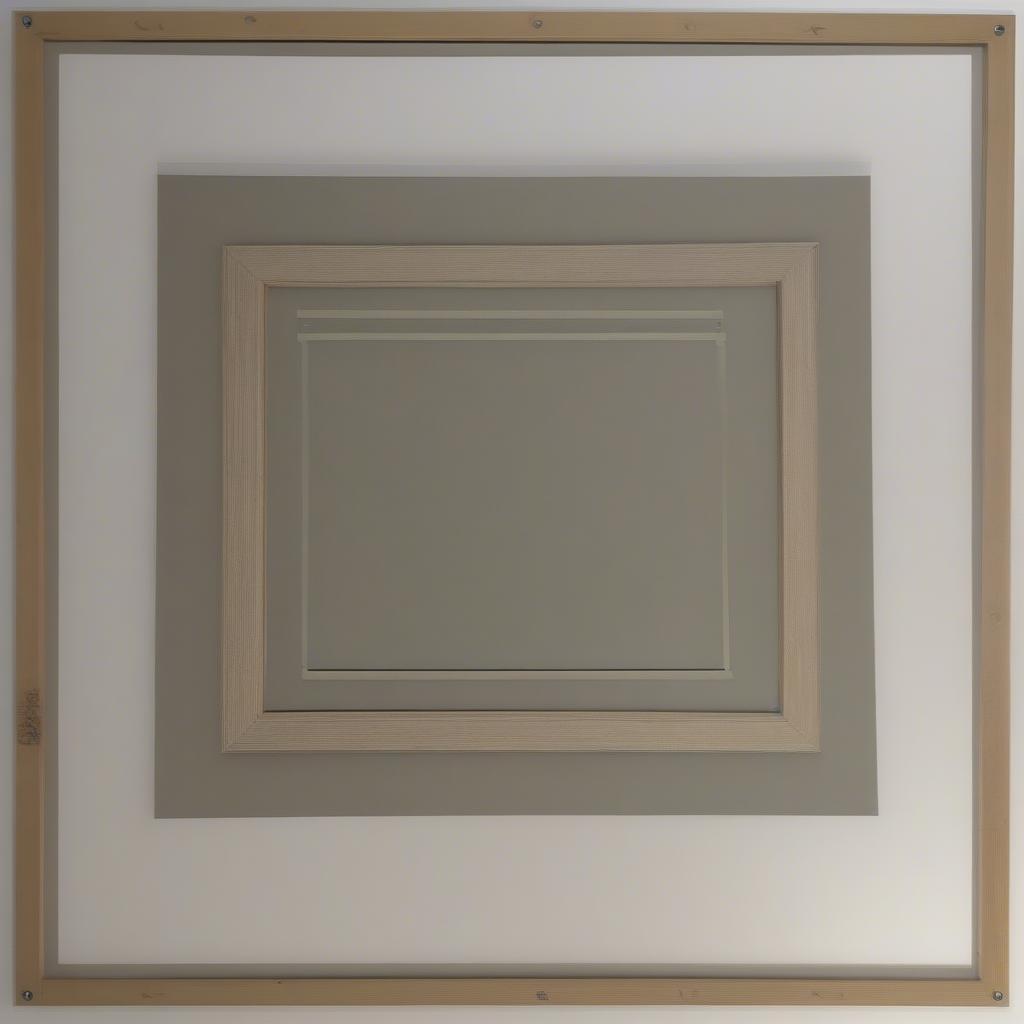 Example of how to properly hang a 24x36 matted frame.