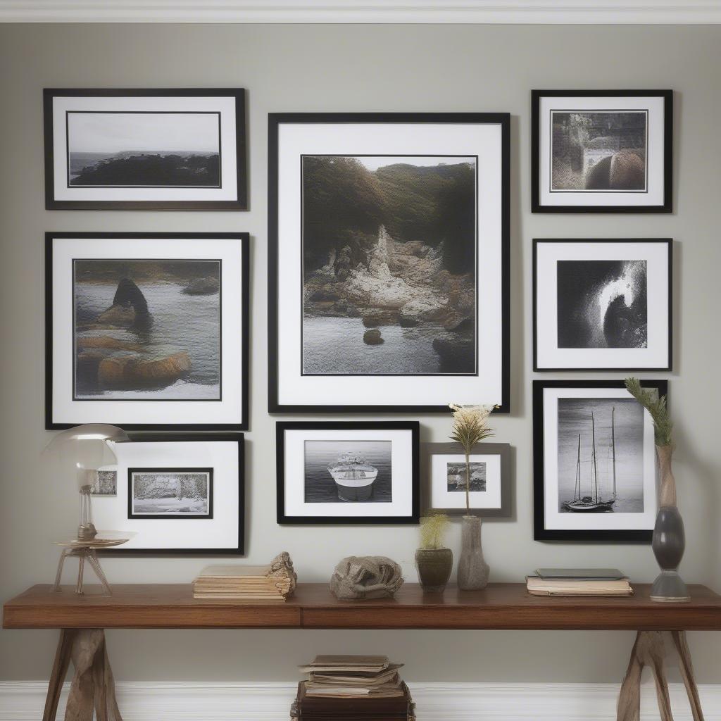 A gallery wall featuring a mix of framed and matted artwork, including a prominent 24x36 matted picture frame, demonstrating various framing and display options.