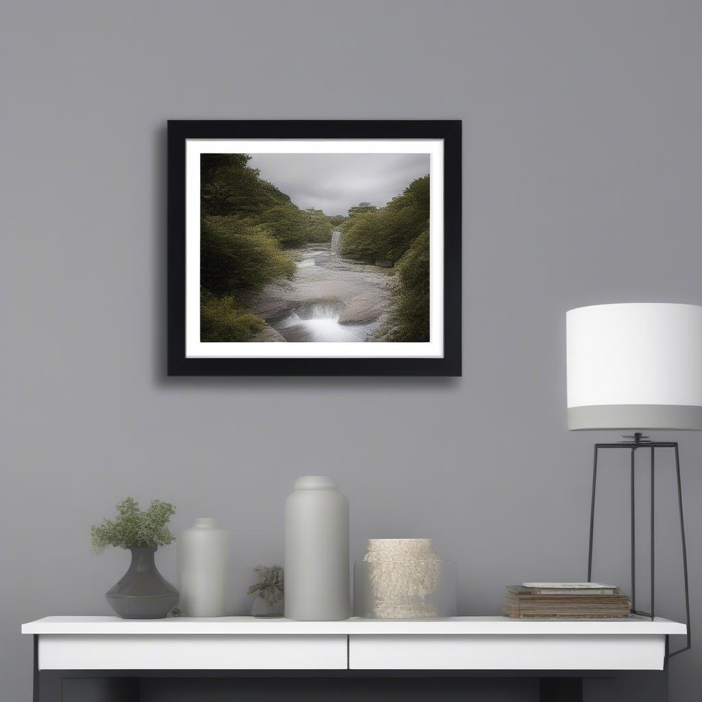 A beautifully matted 24x36 picture frame displaying a vibrant landscape photograph in a modern living room, showcasing the impact of proper framing and matting.