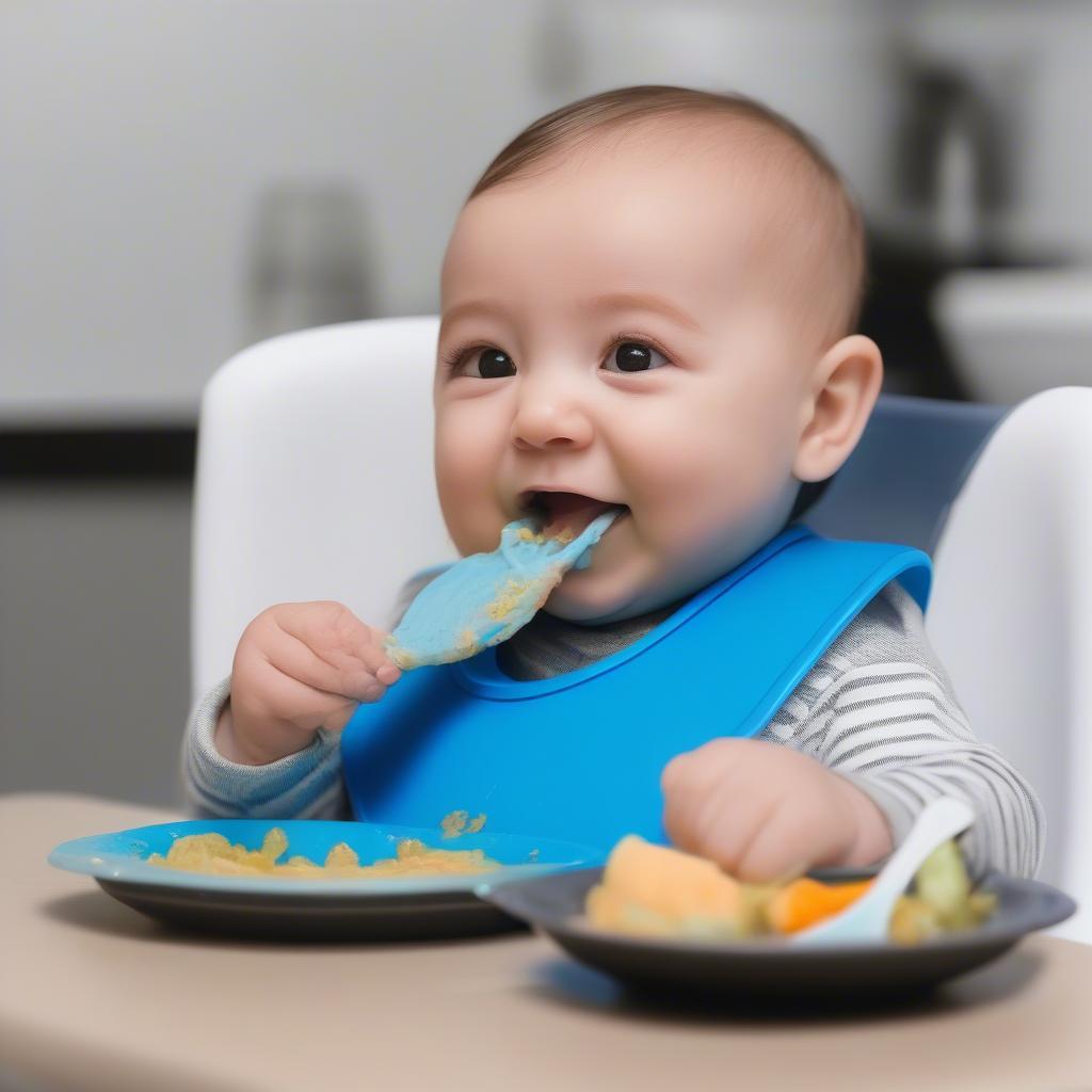 Baby Eating with a Silicone Bib